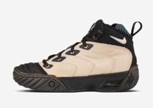 Nike Air Ndestrukt shoes bearing an inverted swoosh on its collar
